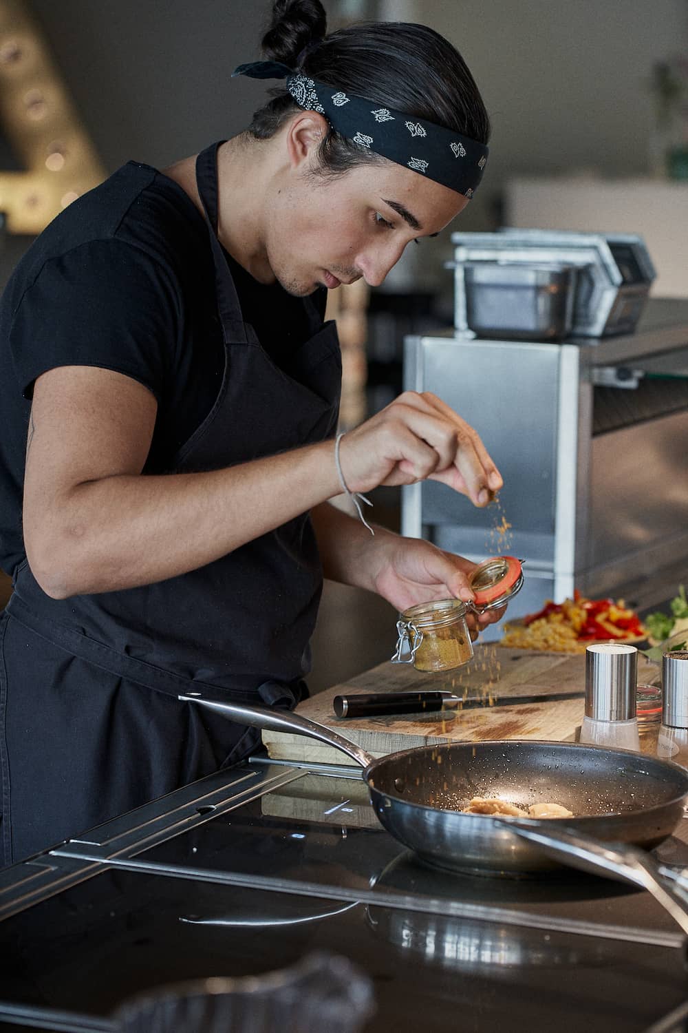 Noah Resteiner preparing vegan food